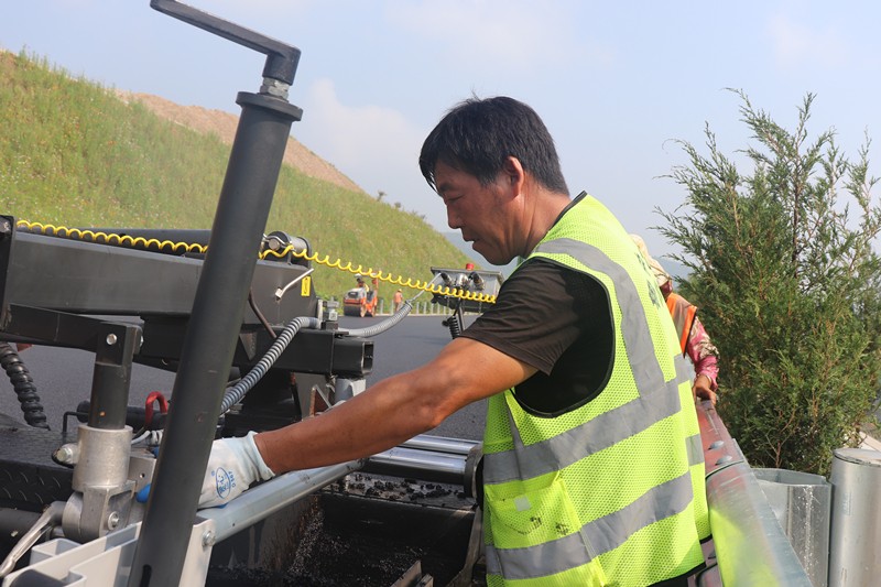 攤鋪機(jī)操作路光會_副本